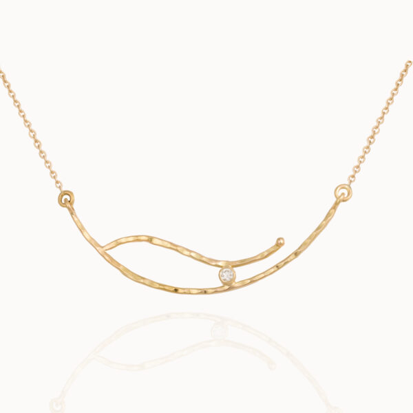 Necklace crafted from 18-karat gold set with a brilliant cut diamond.