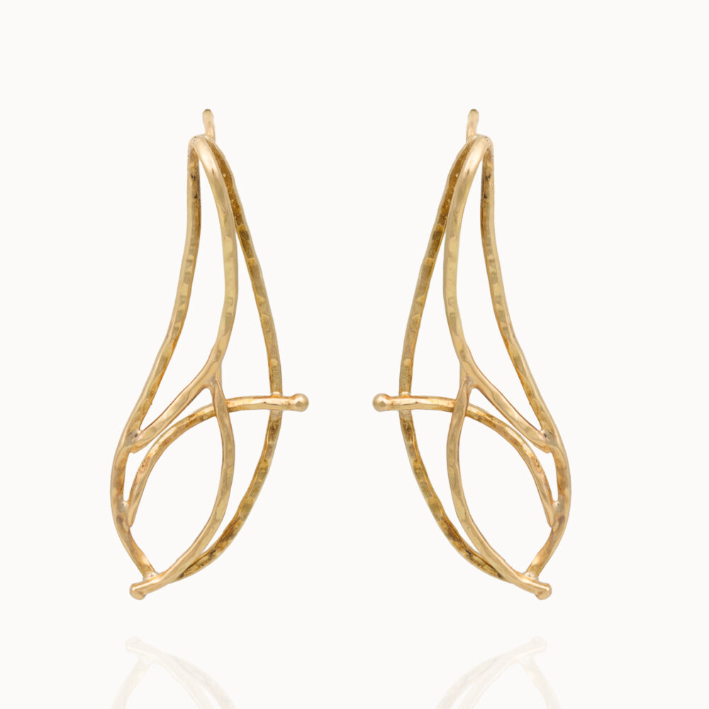 Leaf shaped earrings crafted from 18-karat gold.