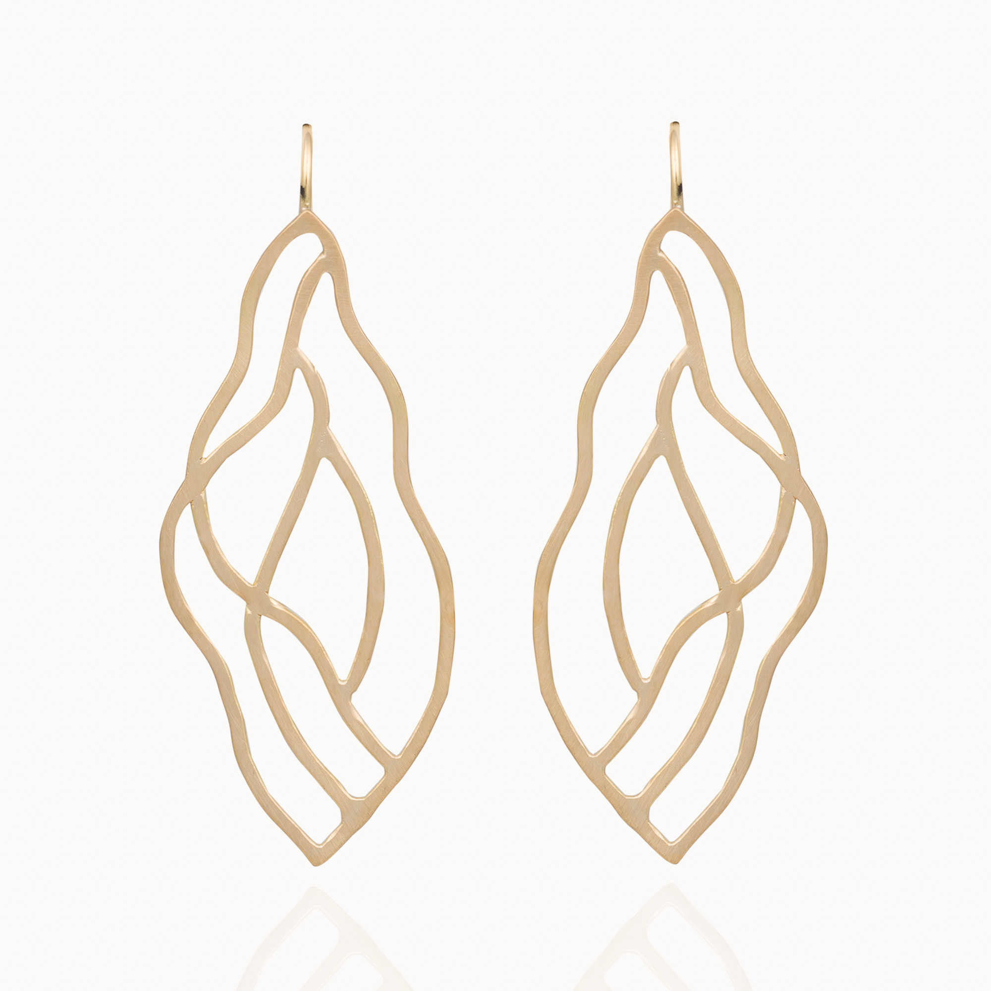 Matte gold earrings made from 18 carat gold.