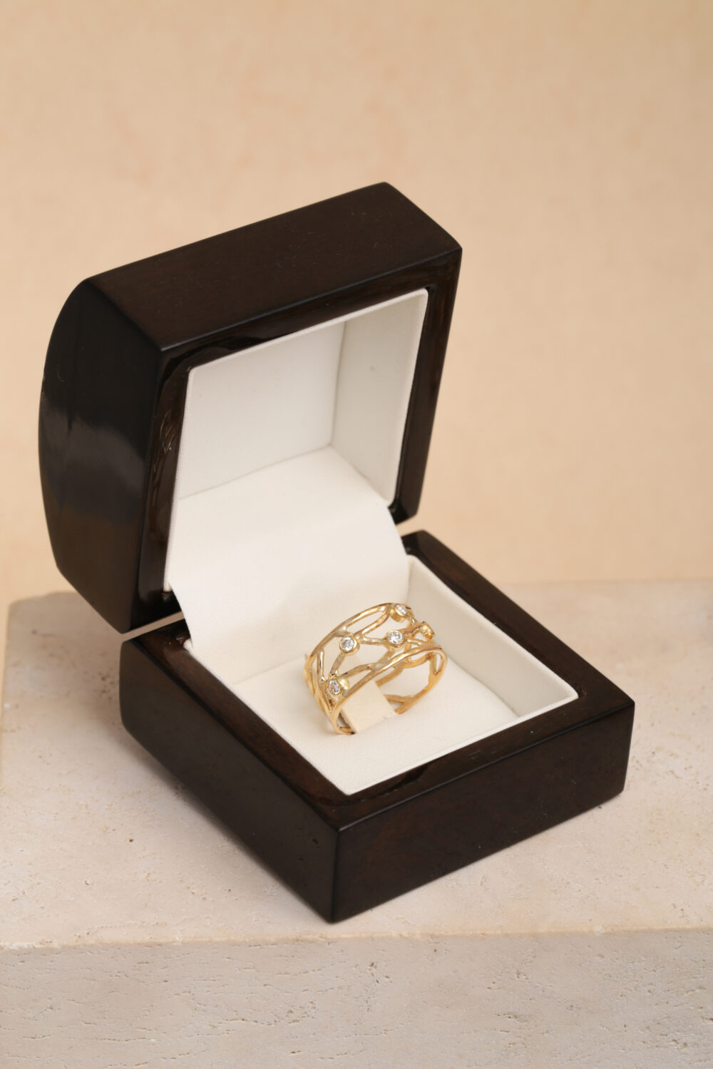 Ring set with diamond gemstones. Created by jewellery designer Pascale Masselis