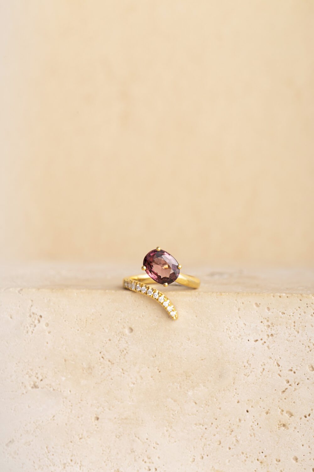 18 Karat gold ring handcrafted in Antwerp, Belgium by Pascale Masselis, set with a pink tourmaline gemstone and briljant cut diamonds.